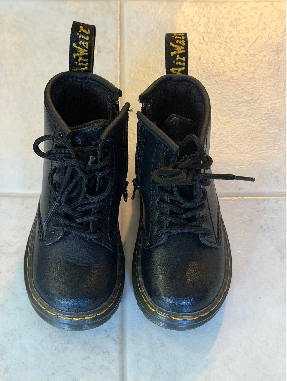 Dr. Martens black leather ankle boots